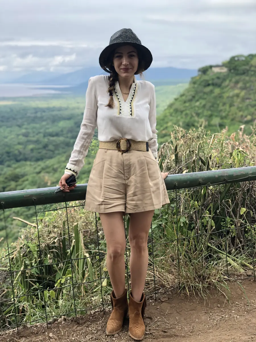 Fatma standing at a viewpoint above the Ngorongoro Crater.